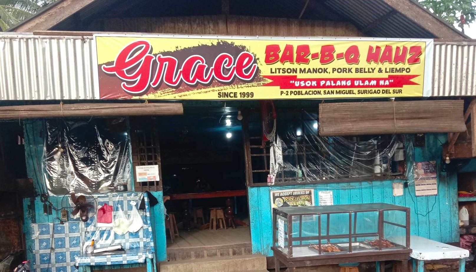 <b class="font-bara"><i class="bi bi-geo-fill h4"></i> GRACE BAR-B-Q HAUZ</b> <br/>The Grace Bb-Q Hauz is one the most delicious food Haus in Poblacion, San Miguel, Surigao del Sur.  There tagline is " USOK PALANG ULAM NA'' they offer Litson Manok, Pork Belly and Liempo and many more.